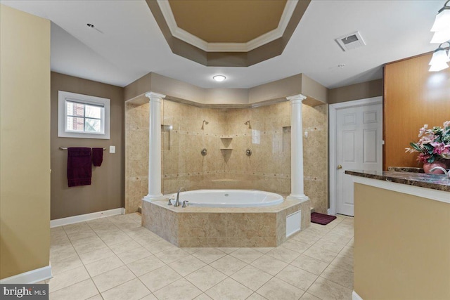 bathroom featuring tiled shower, a garden tub, visible vents, and ornate columns