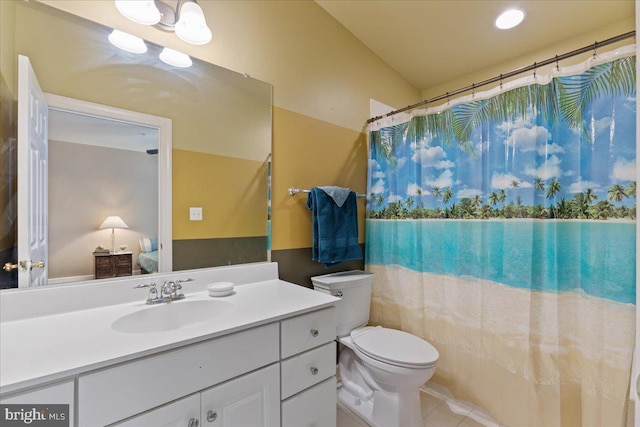 ensuite bathroom with toilet, ensuite bath, curtained shower, tile patterned flooring, and vanity