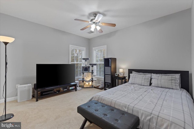 bedroom featuring carpet floors, visible vents, ceiling fan, and baseboards