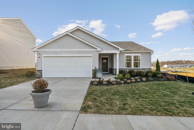 view of front of property with stone siding, an attached garage, a front lawn, and concrete driveway