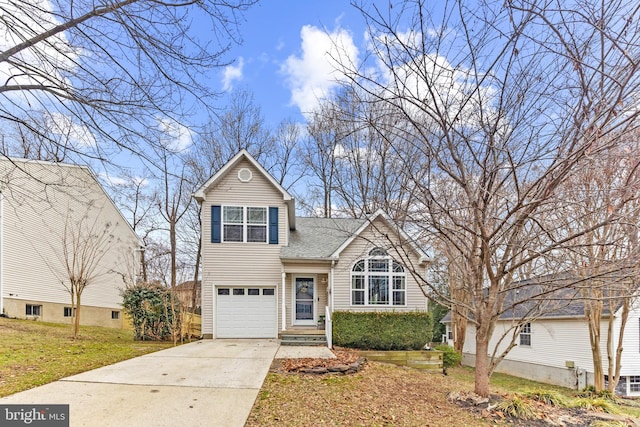 traditional home featuring driveway and a garage