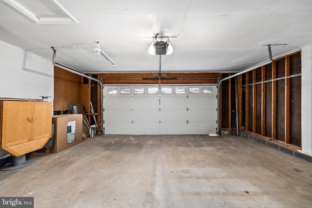 garage featuring a garage door opener