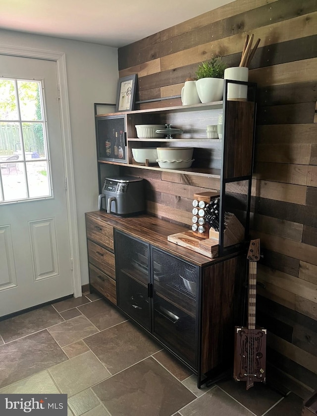 bar featuring stone finish flooring