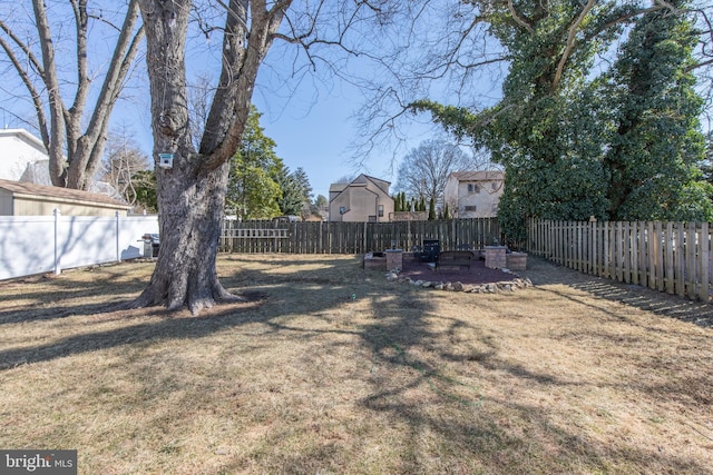 view of yard with a fenced backyard