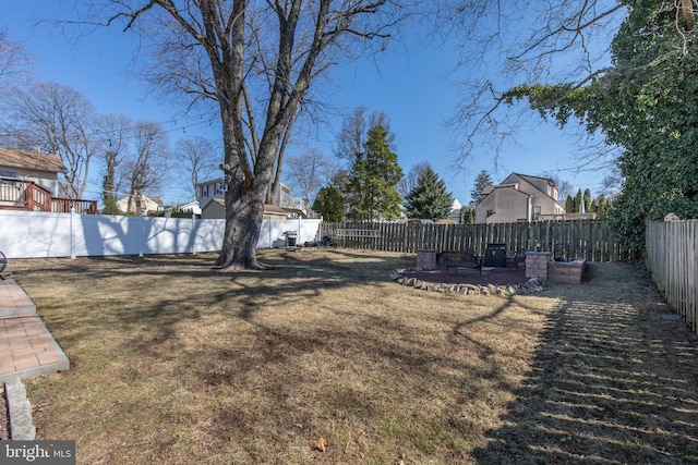 view of yard with a fenced backyard