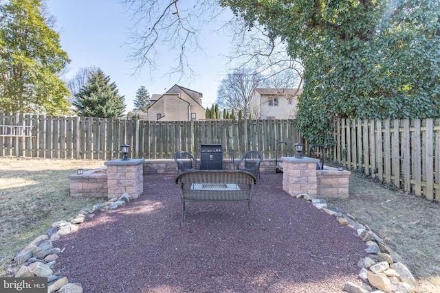 view of patio with a fenced backyard