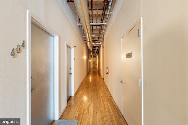 hallway featuring light wood-style floors