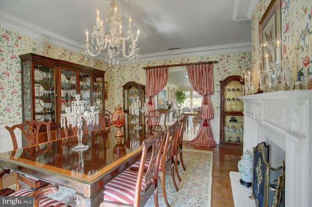 dining space with ornamental molding, visible vents, an inviting chandelier, and wallpapered walls