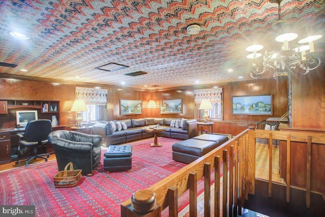 living room with ornamental molding and visible vents