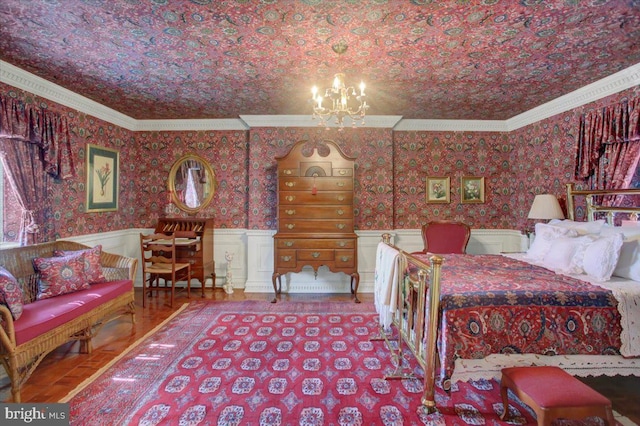 bedroom with a wainscoted wall, ornamental molding, and wallpapered walls