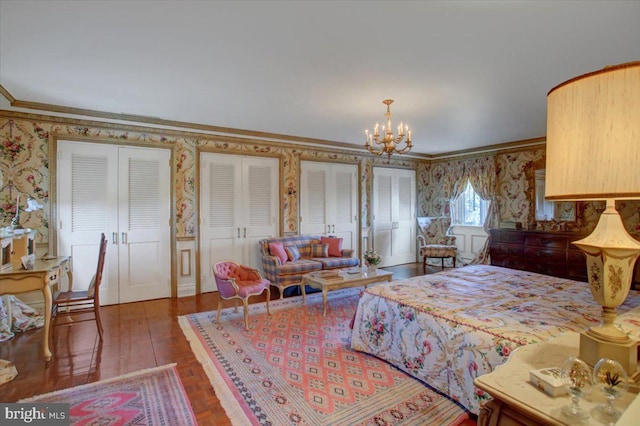 bedroom featuring a notable chandelier, parquet floors, ornamental molding, and wallpapered walls