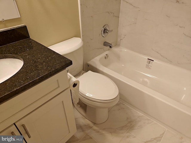 bathroom with toilet, marble finish floor,  shower combination, and vanity