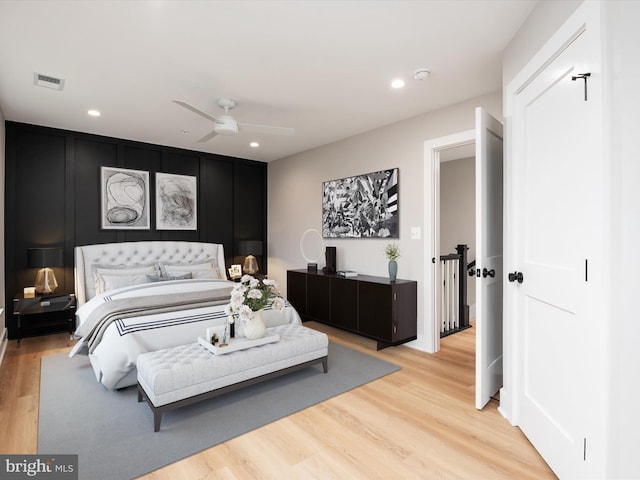 bedroom with light wood-style floors, visible vents, a ceiling fan, and recessed lighting