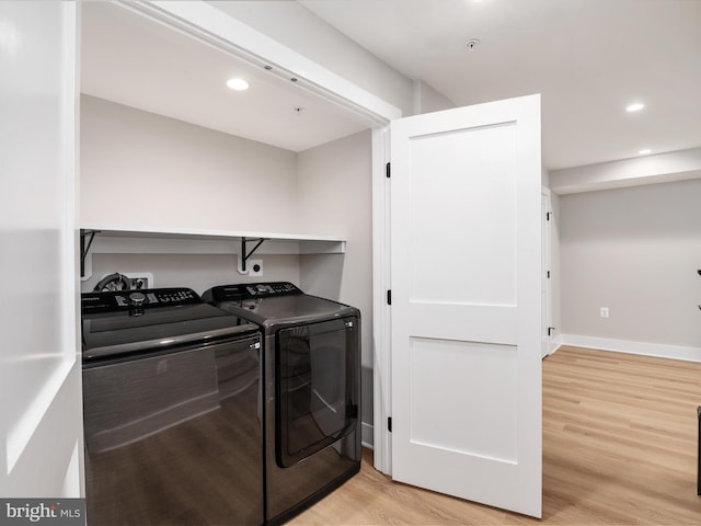 laundry room featuring laundry area, baseboards, light wood-style flooring, separate washer and dryer, and recessed lighting