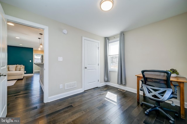 office space featuring recessed lighting, visible vents, baseboards, and dark wood-style flooring