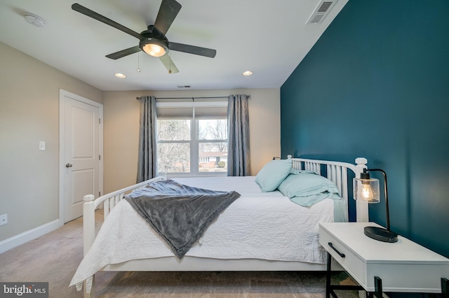 carpeted bedroom with a ceiling fan, recessed lighting, baseboards, and visible vents