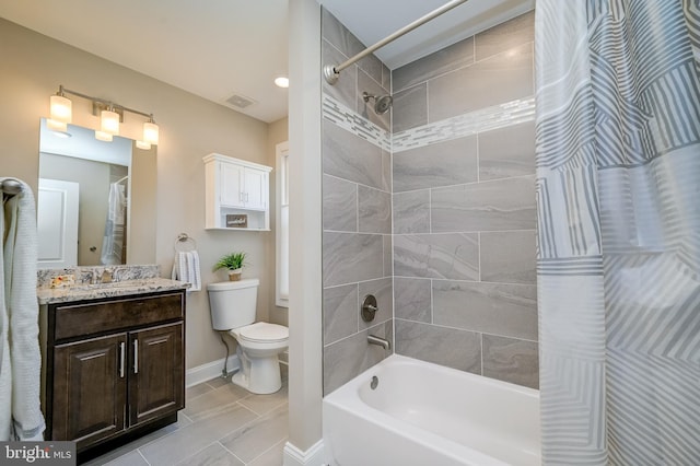 full bath featuring vanity, visible vents, baseboards, toilet, and shower / tub combo with curtain