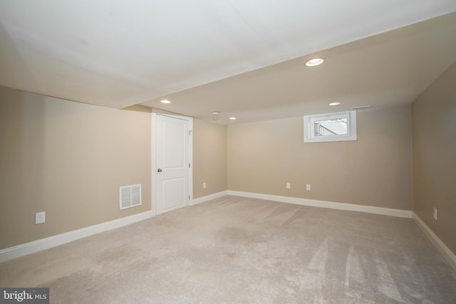 basement featuring recessed lighting, visible vents, baseboards, and carpet flooring