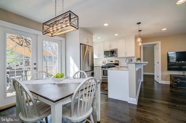 dining room with recessed lighting, french doors, baseboards, and dark wood-type flooring