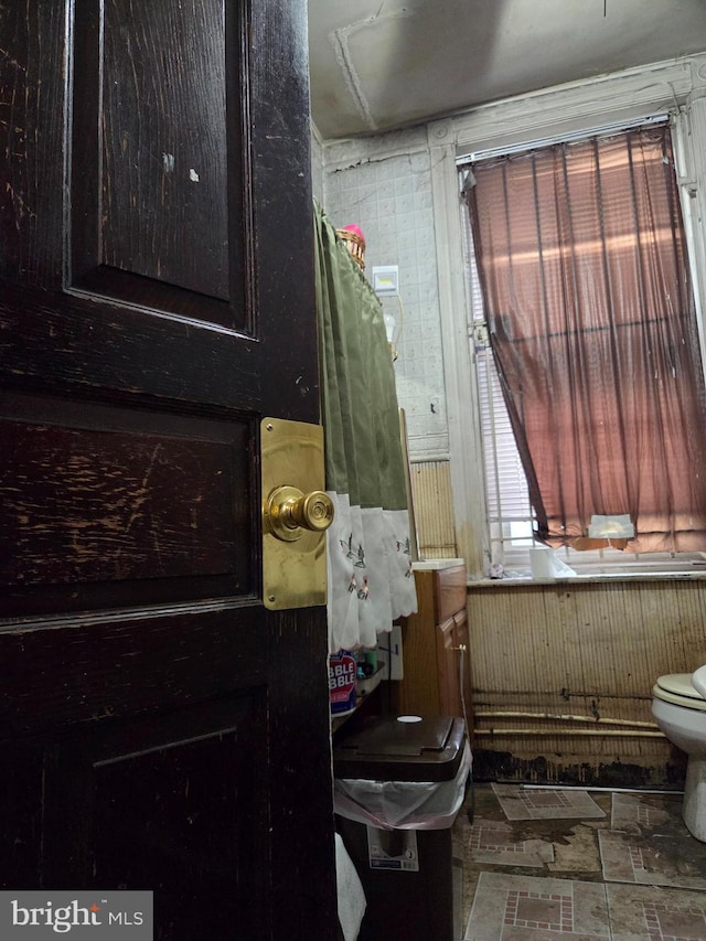 1507 Belmont Ave, Philadelphia, PA 19104 - bathroom with toilet and wood walls