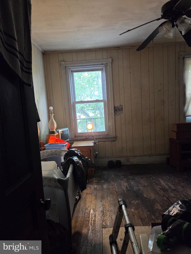 1507 Belmont Ave, Philadelphia, PA 19104 - bedroom featuring hardwood / wood-style floors, wood walls, and ceiling fan