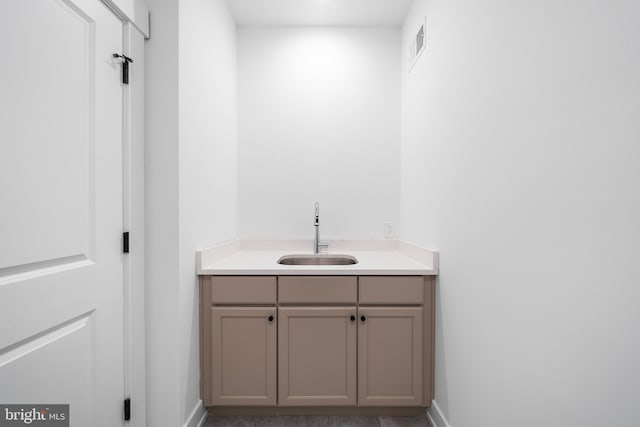 bathroom featuring visible vents and vanity