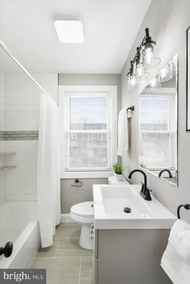 full bath with toilet, vanity, baseboards, tile patterned floors, and shower / bath combination with curtain