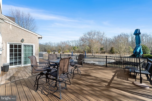 deck featuring outdoor dining space