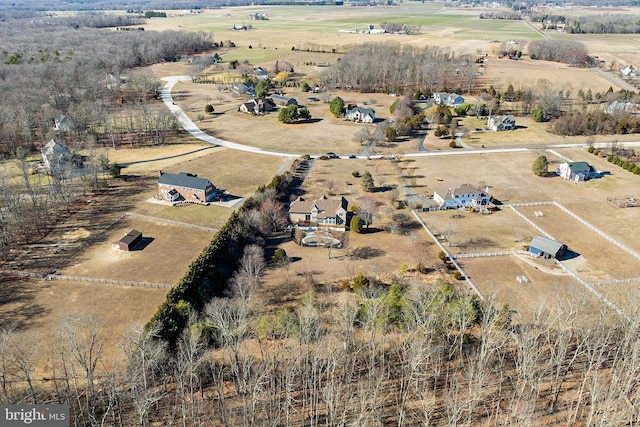 birds eye view of property featuring a rural view