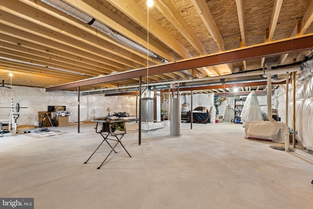 unfinished basement with water heater