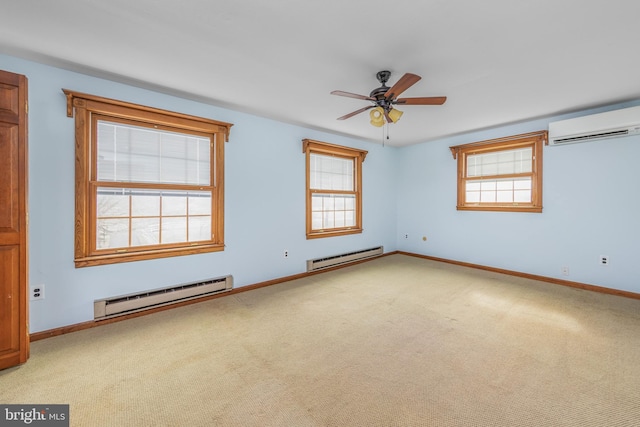 empty room with carpet flooring, a healthy amount of sunlight, a baseboard heating unit, and a wall unit AC