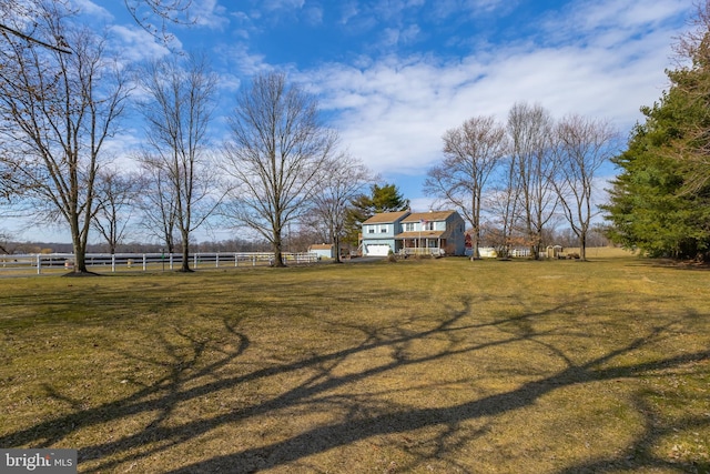 view of yard with fence