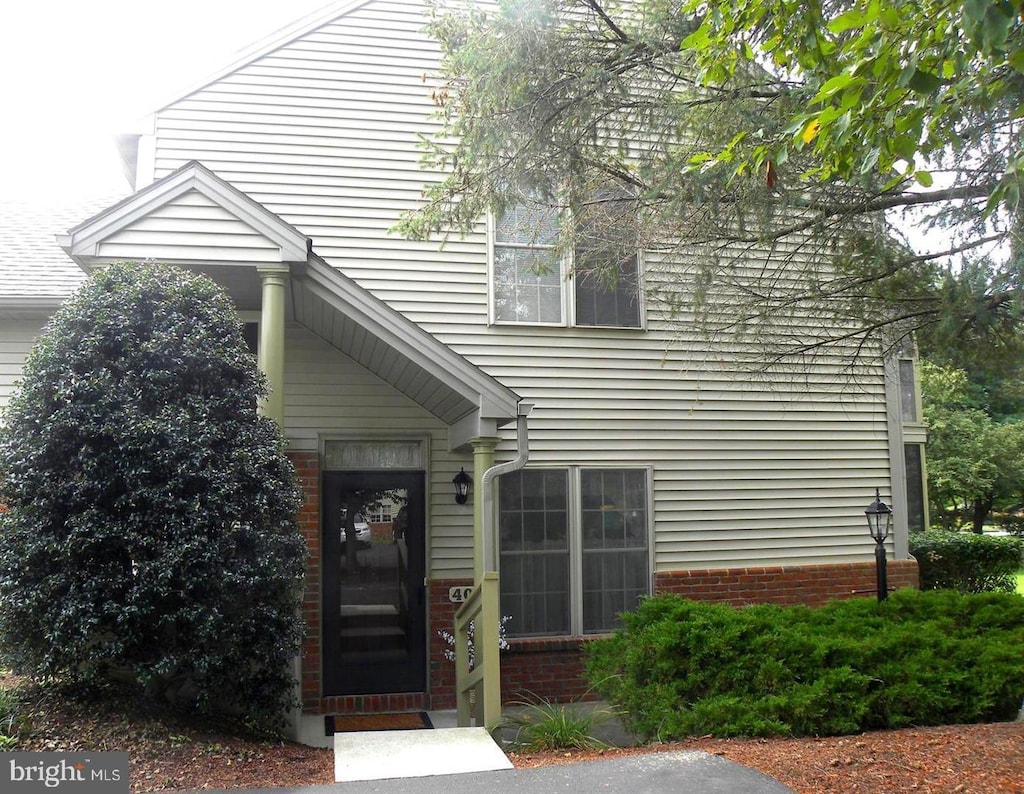 view of front of property with brick siding