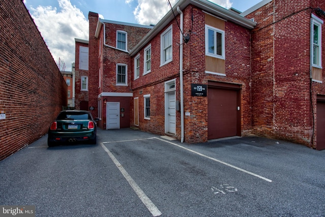 view of building exterior featuring an attached garage