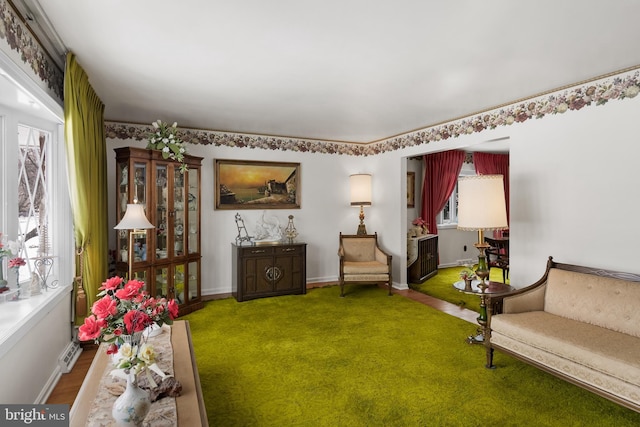 sitting room featuring baseboards