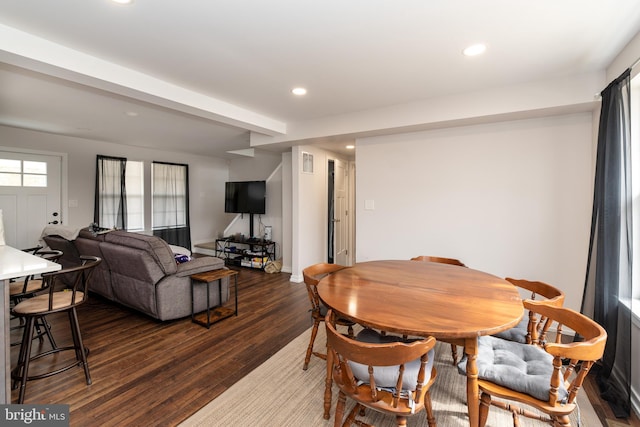 dining space featuring dark wood-type flooring, visible vents, and recessed lighting