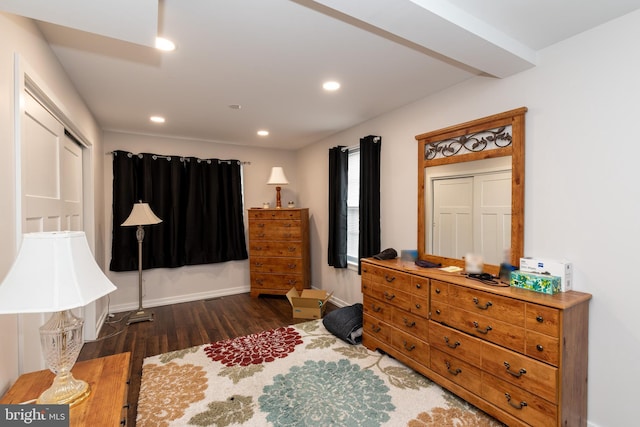 bedroom featuring baseboards, wood finished floors, and recessed lighting