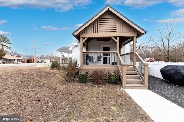 view of front of house with fence