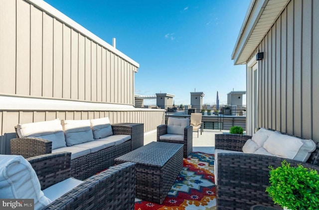 view of patio / terrace with outdoor lounge area and a balcony