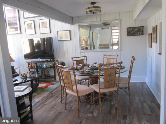 dining room with wood finished floors