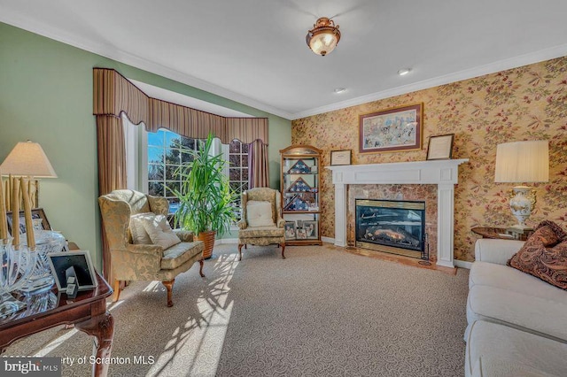 living room featuring baseboards, ornamental molding, a high end fireplace, and wallpapered walls