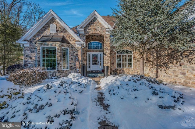 view of front of house with stone siding