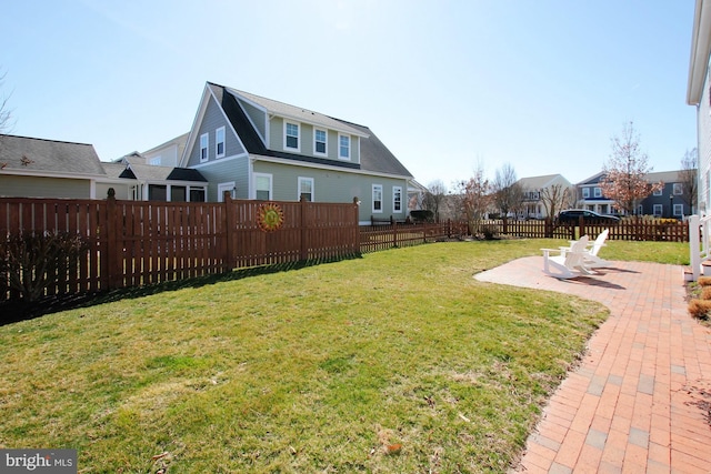 view of yard featuring a fenced backyard and a patio area