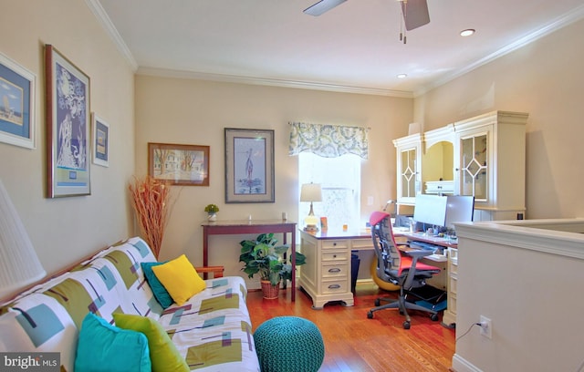 office space featuring recessed lighting, crown molding, ceiling fan, and wood finished floors