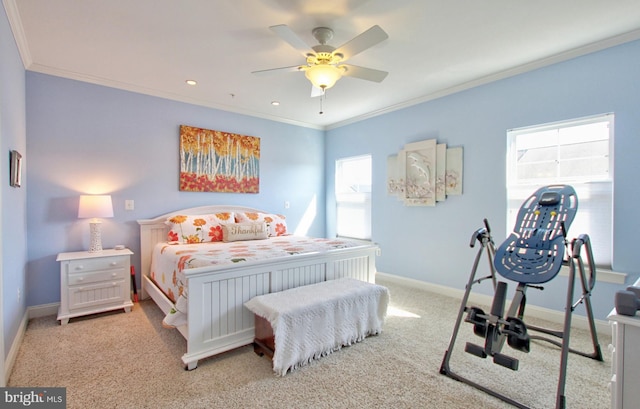 carpeted bedroom with ceiling fan, recessed lighting, baseboards, and ornamental molding