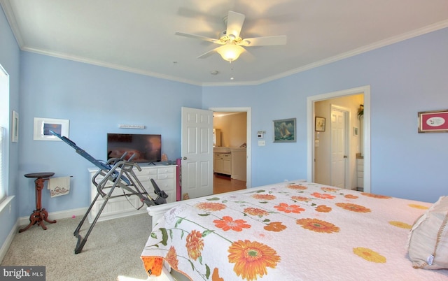 bedroom with ornamental molding, baseboards, and carpet floors