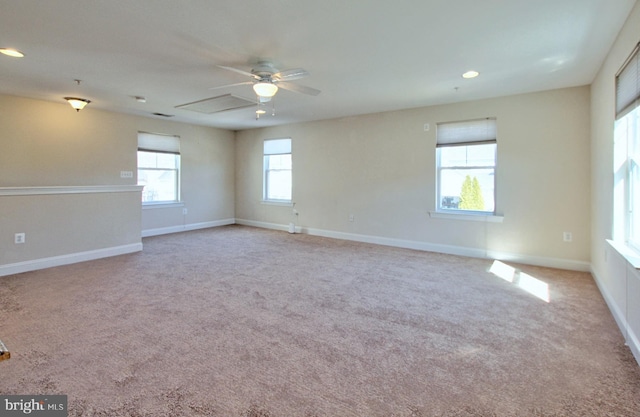 empty room with recessed lighting, baseboards, carpet, and ceiling fan