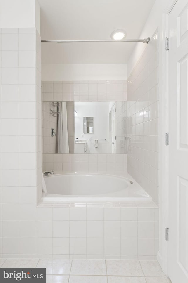 full bathroom featuring tile patterned flooring