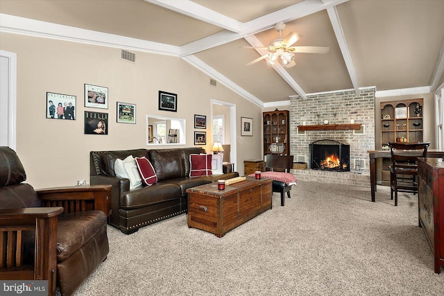 carpeted living room featuring ceiling fan, visible vents, a fireplace, and vaulted ceiling with beams