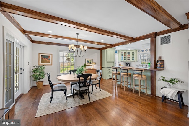 dining space featuring visible vents, beam ceiling, baseboards, and dark wood-style floors